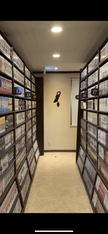 Shelves of manga at a manga cafe.