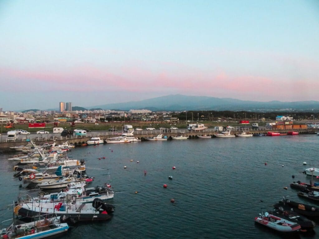 Mt. Hallasan sits behind a port in Jeju.