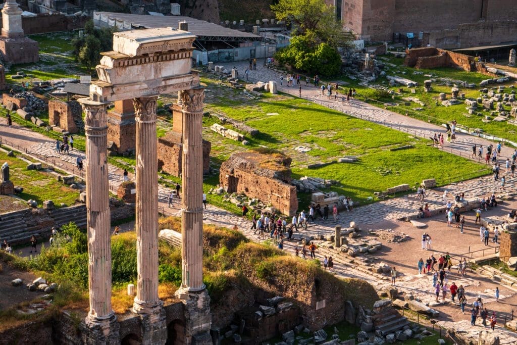 People tour the Roman forum as seen from Palatine Hill.